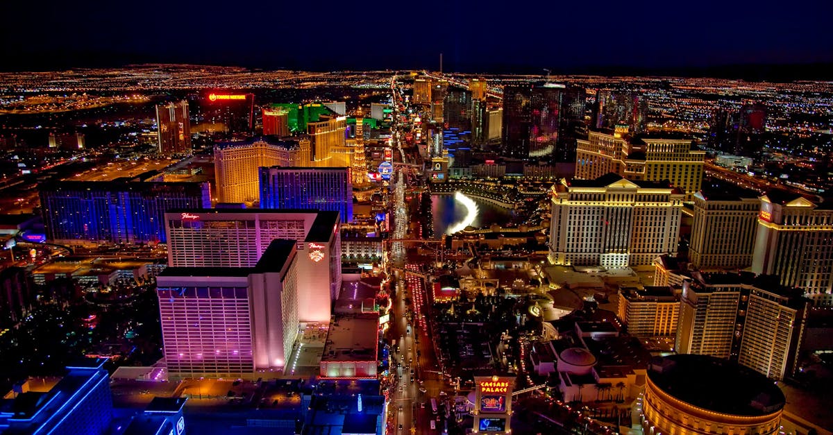 Stunning aerial view of Las Vegas Strip glowing at night with vibrant neon lights and bustling nightlife.
