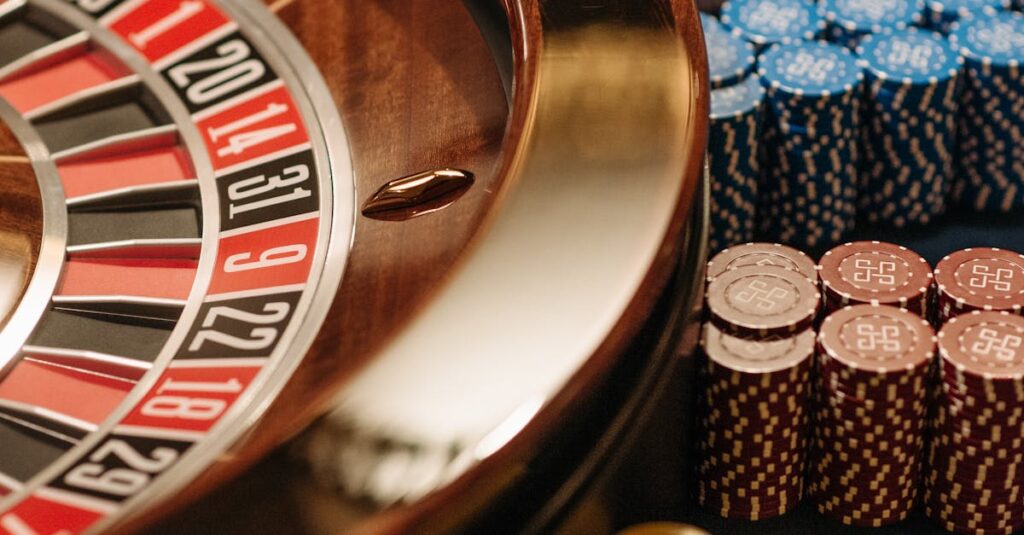 Close-up of a roulette table with colorful chips at a casino.